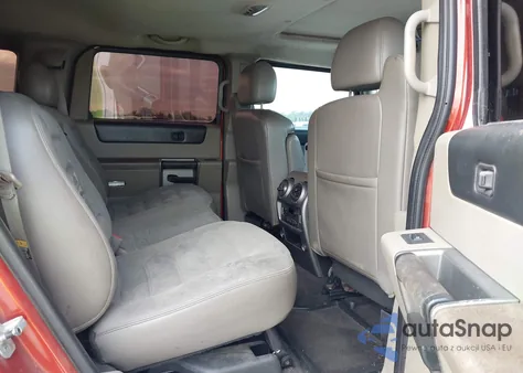 2003 Hummer H2 z USA, uszkodzony, nr VIN 5GRGN23U13H122297